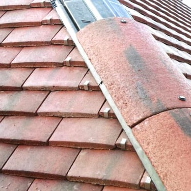 Ridge tiles firmly installed on this project.