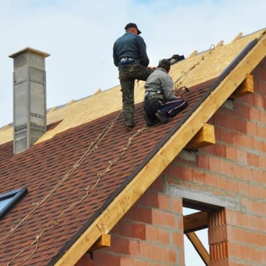 Tiling almost completed on one side of the new roof.