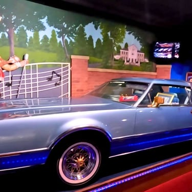 A light-blue 1975 Lincoln Continental Mark IV, formerly owned by Elvis Presley, on display
