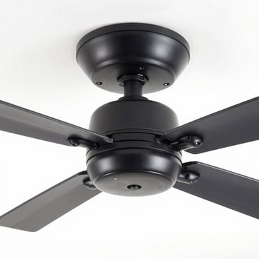 High-key studio shot of a premium matte-black ceiling fan, clean metallic textures, sharp focus, white background, 50mm