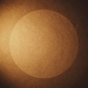 Minimalist album cover art with a simple circle design on rustic paper texture, warm shadows, vintage style.