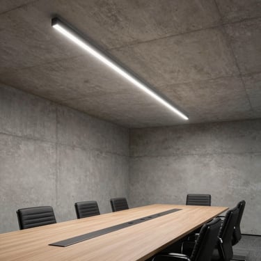 Minimalist corporate boardroom, sleek architectural linear lights recessed in a raw concrete ceiling, daylight.
