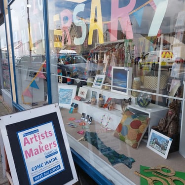 Exterior shop window and A board open sign