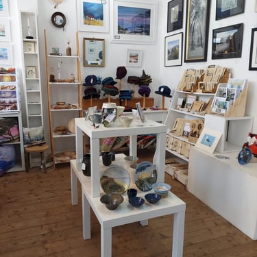 Interior of shop with products on walls and shelves