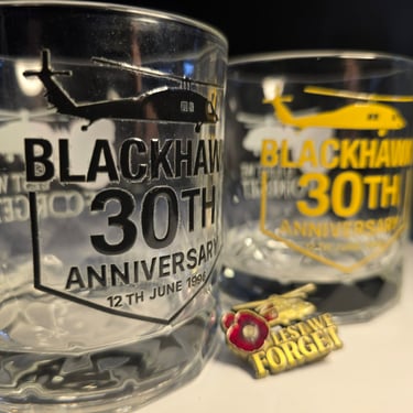 BH30 Connexion whisky glasses with black and gold Blackhawk 30th anniversary graphics