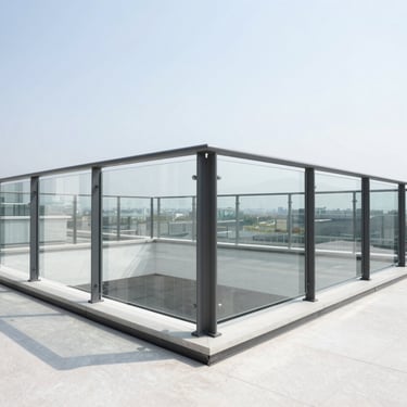 Architectural glass railing with high-grade anodized aluminum profiles on a modern terrace, clean lines