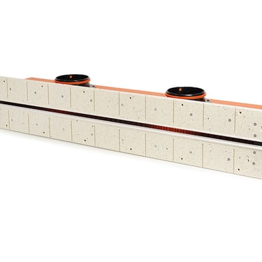 ERGOVENT LINEO PRO 125 PUZZLE angled view showing gypsum body with black slot grille, two duct inlets and puzzle lock edges