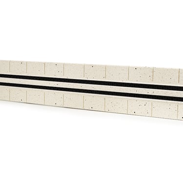ERGOVENT LINEO PRO PUZZLE 2-slot moulage 20x1050mm angled view showing dual slot grilles and puzzle lock edges