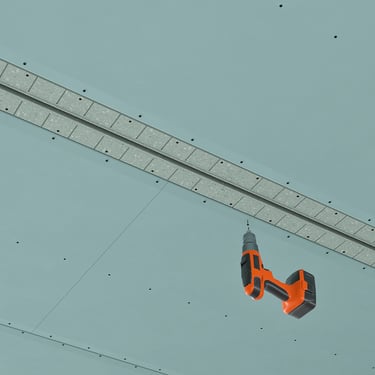 ERGOVENT LINEO PRO PUZZLE installation render showing diffuser face being screwed into gypsum ceiling with drill