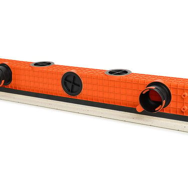 ERGOVENT LINEO PRO PUZZLE 2-slot 75x1050mm angled view showing orange plenum with round duct inlets and gray gypsum base