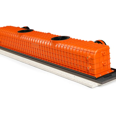 ERGOVENT LINEO PRO PROFILE top angled view showing orange plenum body with round duct inlets and white gypsum base
