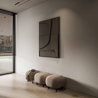 Minimal entryway with ERGOVENT LINEO diffuser recessed in white ceiling, sculptural wall art and ottomans.