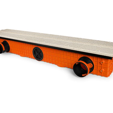 ERGOVENT LINEO PRO PUZZLE front angled view showing orange plenum body with round duct inlets and gray gypsum face