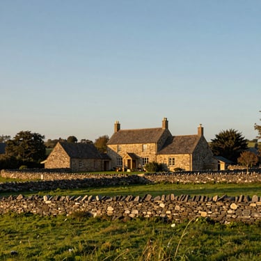 Sprawling rural farmhouse integrated into a low-lying green landscape, golden hour light, natural stone walls, wide environmental angle.
