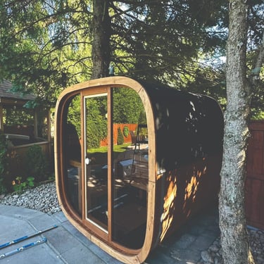 Barrel sauna in forest setting with cedar exterior crafted for Outdoor sauna Ontario climate