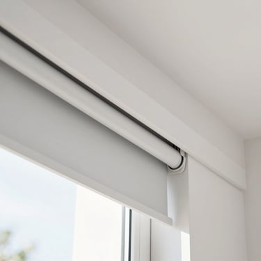 Macro shot of a sleek motorized roller blind mechanism integrated into a clean white cornice, subtle modern design, bright daylight, 35mm