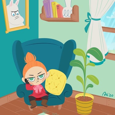 niña sentada en un sofa aburrida en colores verde y azul