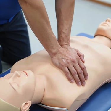 Close-up of hands performing precise chest compressions on a CPR mannequin during a training session.