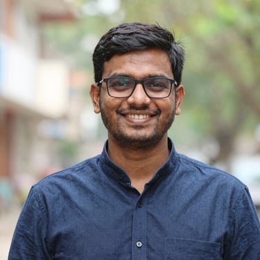 A group of students enjoying a meal together in the Krishna Kripa Boys PG common dining area.
