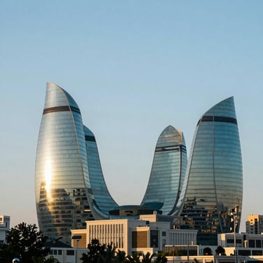 Modern Flame Towers of Baku, Azerbaijan reflecting the bright afternoon sun, clean architectural lines.