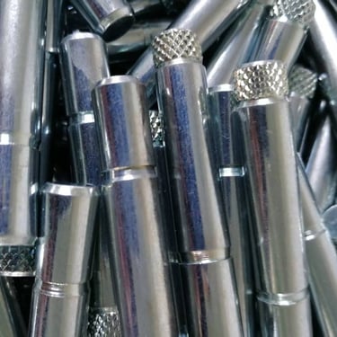 Pins on automotive components