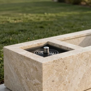 A modern sub-irrigation system installed inside an elegant travertine planter, clean lines, technical detail.