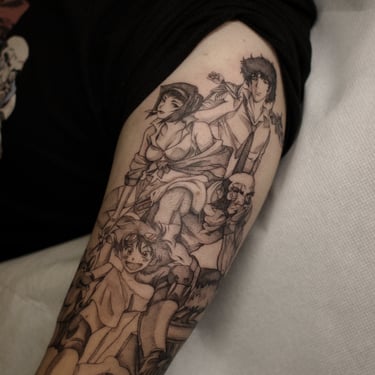 tatouage Cowboy Bebop sur le haut du bras, exécuté par Margot Dubs Tattoo