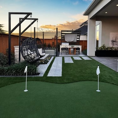 backyard with turf grass installed and new fence
