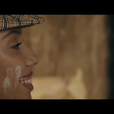 Profile shot of character smiling in The Entomologist film