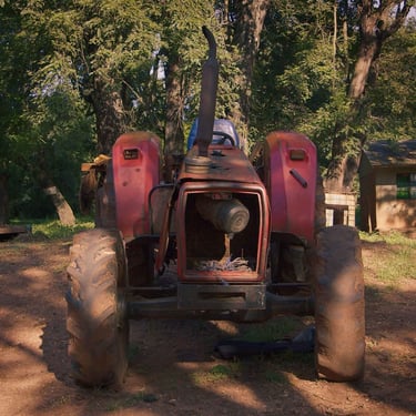 Tractor on a rural farm setting in The Farm We Call Home film.