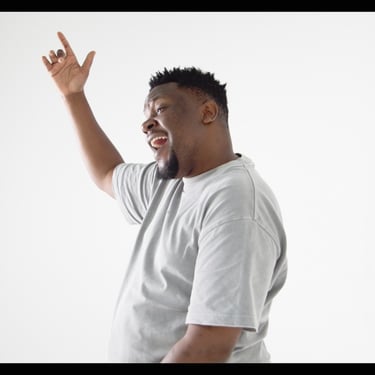 Sam Mjura performing in Wabwino music video by Paul Clement filmed by Daniel da Trindade.