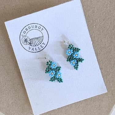Beautifully hand beaded sky blue floral garland earrings made with Czech glass beads