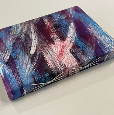 Soft cover journal with decorated spine and link stitch