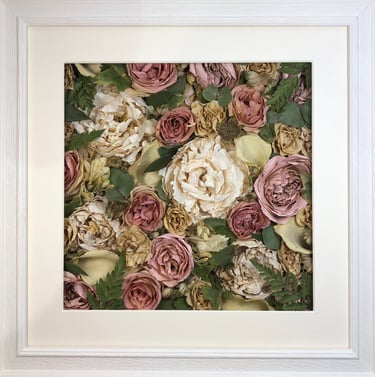a Flower Wall Style bouquet of flowers in a ridged white frame
