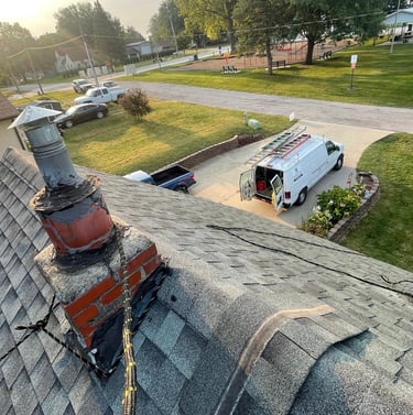 "ProFaster expert conducting a free roof inspection in Des Moines before chimney demolition and roof
