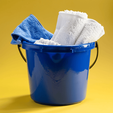 a bucket of towels and towels in a bucket