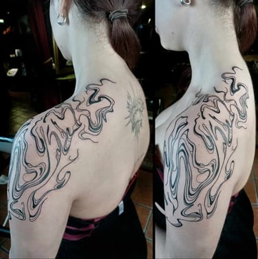 Abstract tattoo on shoulder