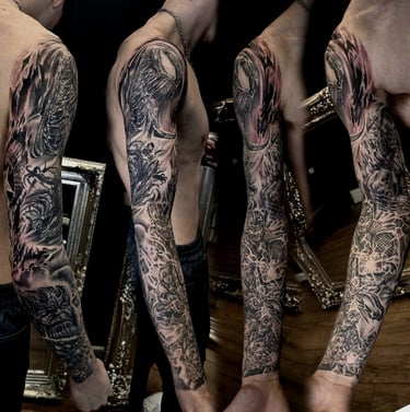Black and grey Marvel realism sleeve tattoo