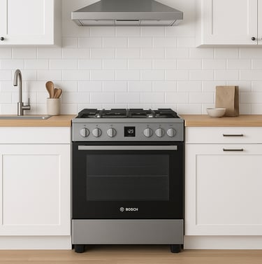 Bosch gas stove in a modern kitchen with white cabinets and wood countertop.