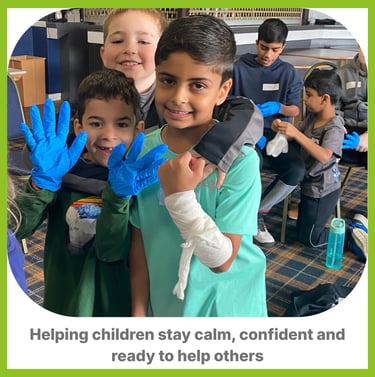 Boys in first aid gloves and bandages smiling after learning what to do if someone was bleeding