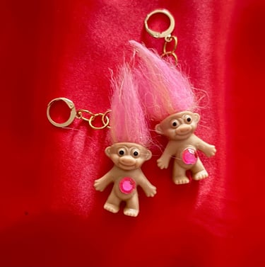 Gold huggie-hoops with dangle pink troll dolls