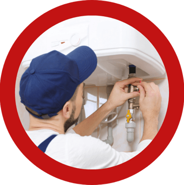 a plumber in a kitchen with a plumber