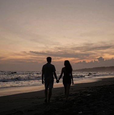 Couple walking hand-in-hand away from the camera on a black sand Bali beach at twilight, sunset glow on the horizon, #3F322A silhouettes, minimalist and timeless storytelling.