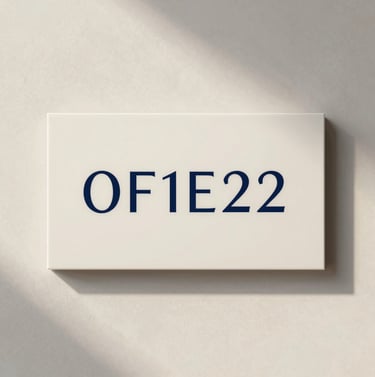 A wide professional shot of branded luxury signage on a textured wall. The design is minimalist and strategic, featuring the logo in #0F1E2E against a #F8F8F4 background. Soft natural light creates an inviting, sophisticated aura.