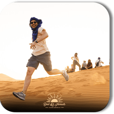 people enjoying in the moroccan desert with soul of nomads - dar toda - about us
