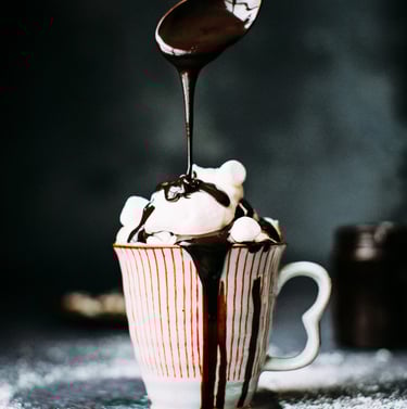 spoonful of chocolate and marshmallows in a coffee bar. Tourism Industry Partnerships