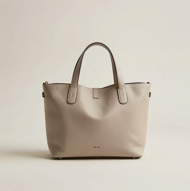 Clean e-commerce photography of a fashion accessory in a bright, modern studio in Istanbul. Soft off-white background with neutral, high-end tones.