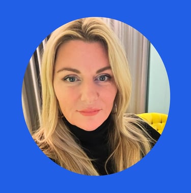 Claire is looking at the camera, with blonde hair and a black turtle neck top