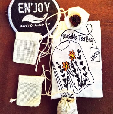 handmade cotton recyclable tea bags on a table