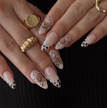 a woman's hands with a manicured manicured manicured manicured mani